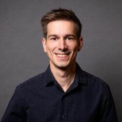 A smiling man, Frederik Merz, CEO of Amperecloud